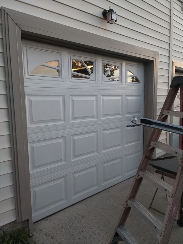 Raised-panel door on cream home