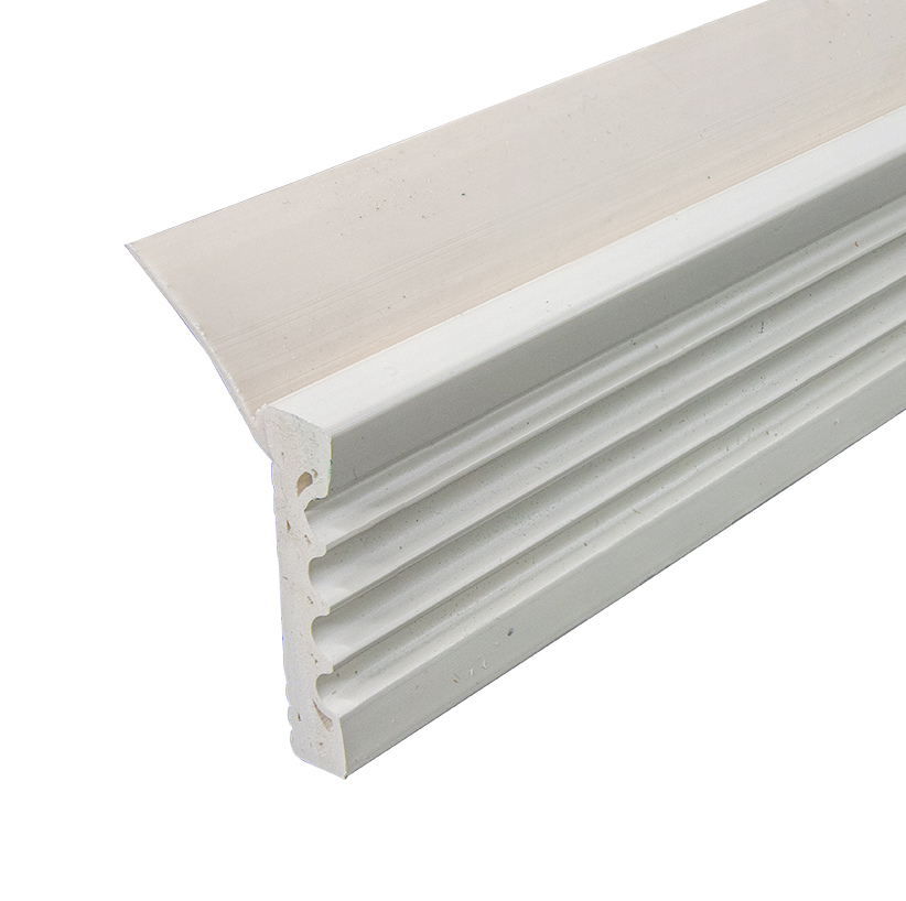 Cellular PVC doorstop molding installed on a Hampton Roads garage door jamb, replacing rotted pine trim