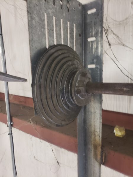 Commercial overhead door cable off the drum