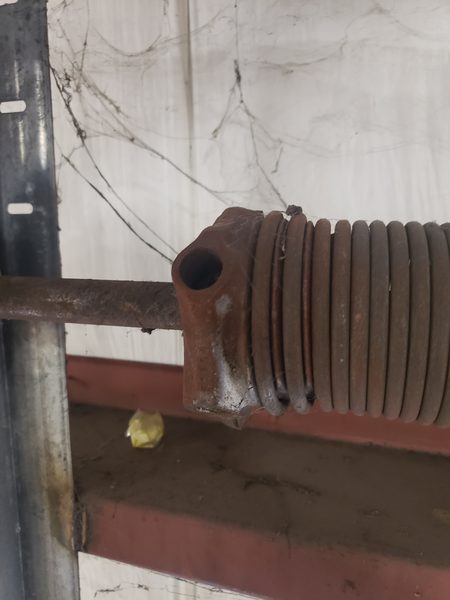 Commercial vertical-track torsion spring