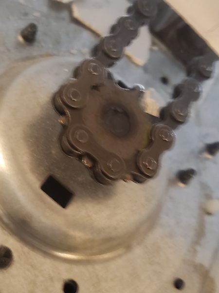 Garage door opener gear and sprocket replacement